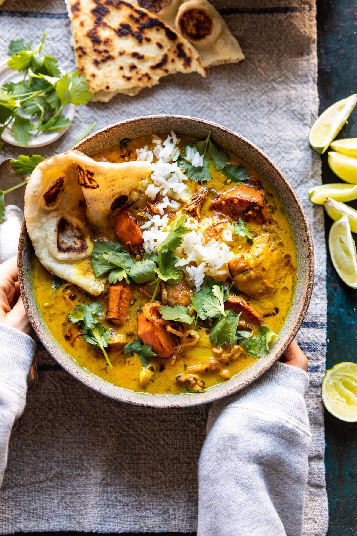 30 Minute Coconut Milk Braised Chicken with Sweet Potatoes and Rice | halfbakedharvest.com #instantpot #easyrecipes #healthy